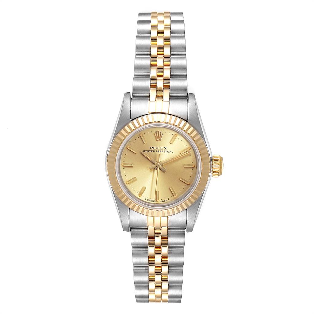 The image shows a front view of a Rolex Oyster Perpetual 67193 Women
s Steel and Gold (two tone) Champagne Dial 67193 Women
s Steel and Gold (two tone) Champagne Dial watch with a gold and silver bracelet and a gold dial.