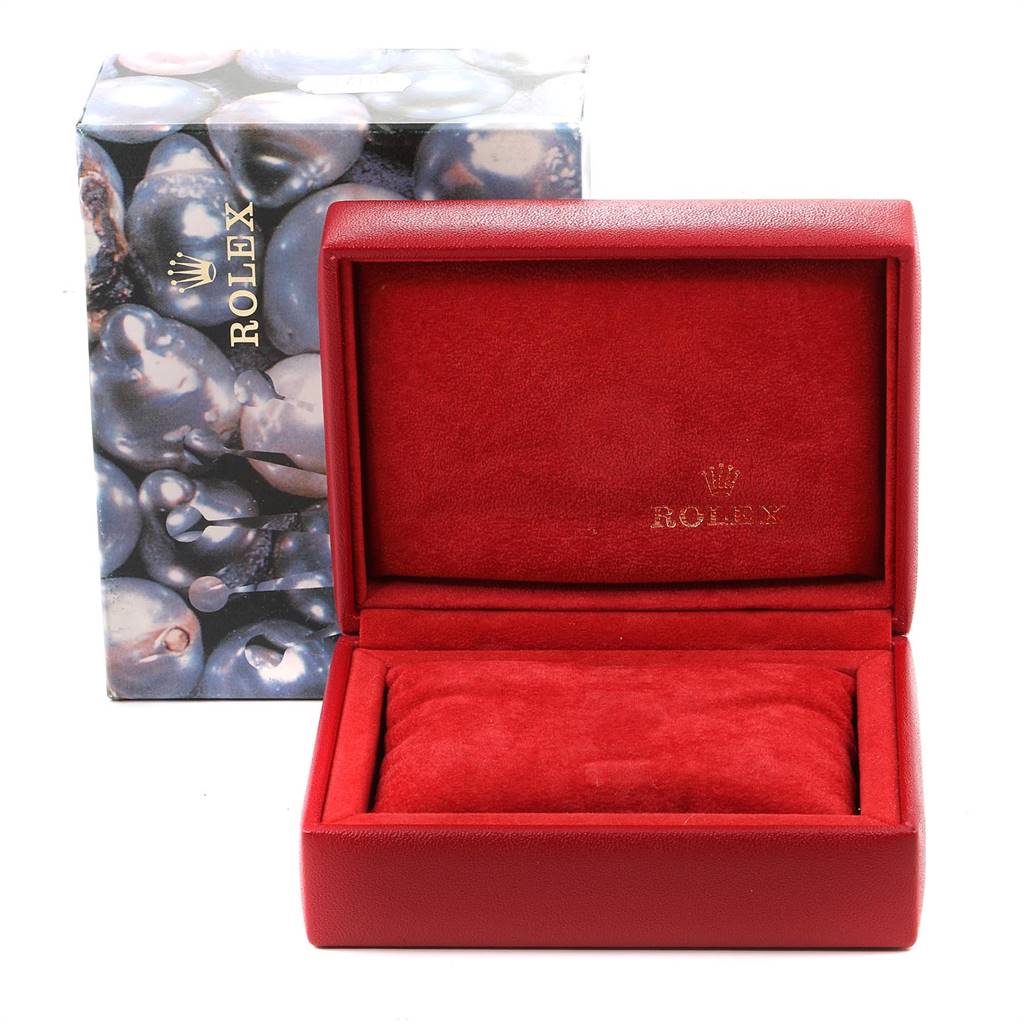 This image shows a red, open Rolex watch box with the brand logo and name, designed for the Oyster Perpetual model.