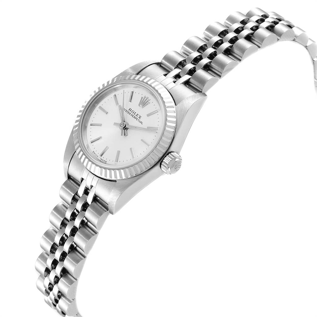 The Rolex Oyster Perpetual 76094 Women's Stainless Steel Silver Dial 76094 Women's Stainless Steel Silver Dial watch is shown at a slight angle highlighting the dial, bezel, and bracelet.
