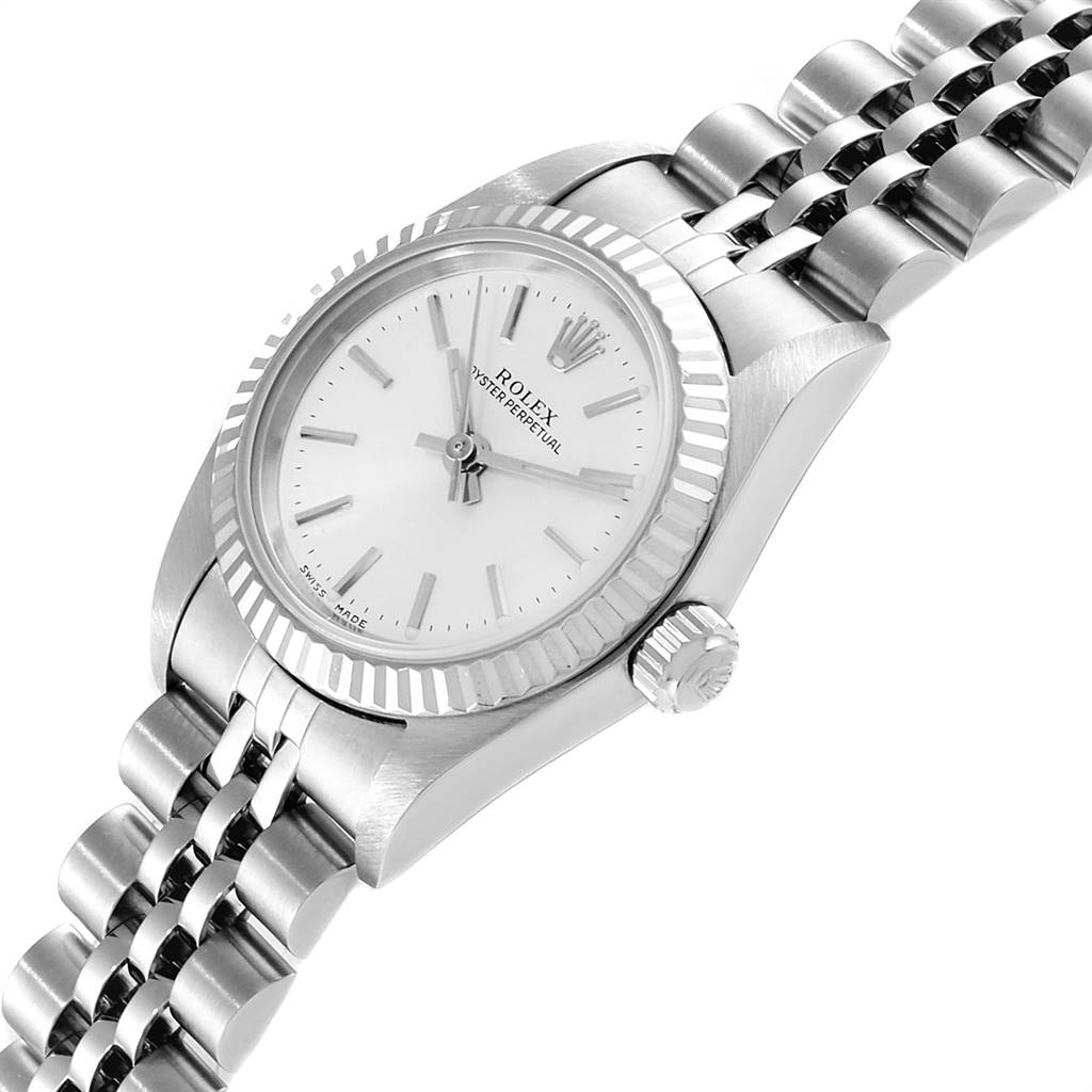 The angled view highlights the face, bezel, and bracelet of the Rolex Oyster Perpetual 76094 Women's Stainless Steel Silver Dial 76094 Women's Stainless Steel Silver Dial watch.