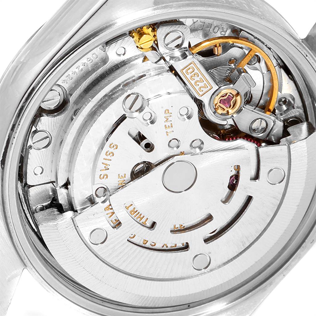 This image shows the inner workings and movement mechanism of a Rolex Oyster Perpetual 76094 Women's Stainless Steel Silver Dial 76094 Women's Stainless Steel Silver Dial watch from a back angle.