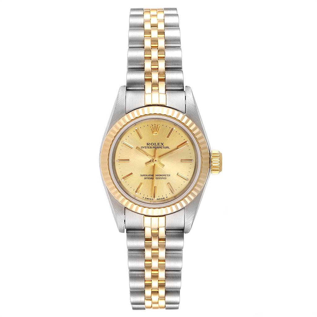 The image shows a Rolex Oyster Perpetual 67193 Women
s Steel and Gold (two tone) Champagne Dial 67193 Women
s Steel and Gold (two tone) Champagne Dial watch from a top-down angle, highlighting its dial, bezel, and bracelet.