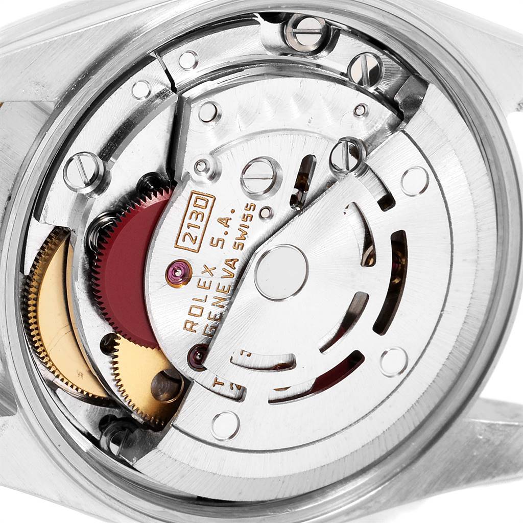This image shows the movement mechanism of a Rolex Oyster Perpetual 67193 Women
s Steel and Gold (two tone) Champagne Dial 67193 Women
s Steel and Gold (two tone) Champagne Dial watch viewed from the back.