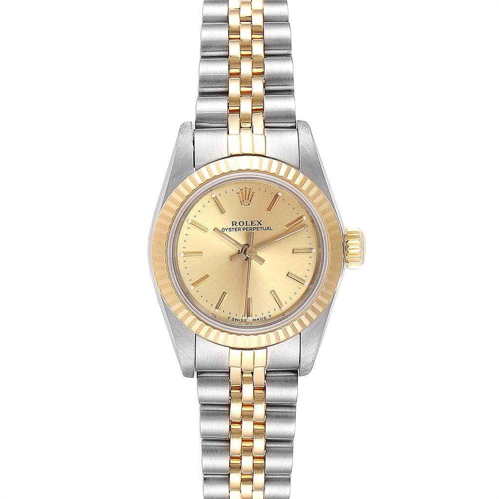 This image shows a front view of the Rolex Oyster Perpetual 67193 Women
s Steel and Gold (two tone) Champagne Dial 67193 Women
s Steel and Gold (two tone) Champagne Dial watch, highlighting its dial, bezel, and bracelet.