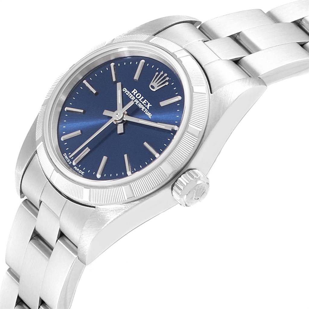 The image shows a Rolex Oyster Perpetual 76030 Women
s Stainless Steel Blue Dial 76030 Women
s Stainless Steel Blue Dial watch at an angled view, highlighting the blue dial, crown, and part of the bracelet.