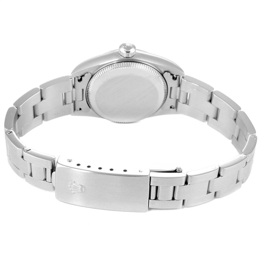 The image shows the back view of the Rolex Oyster Perpetual 76030 Women
s Stainless Steel Blue Dial 76030 Women
s Stainless Steel Blue Dial watch, including the case back and clasp.