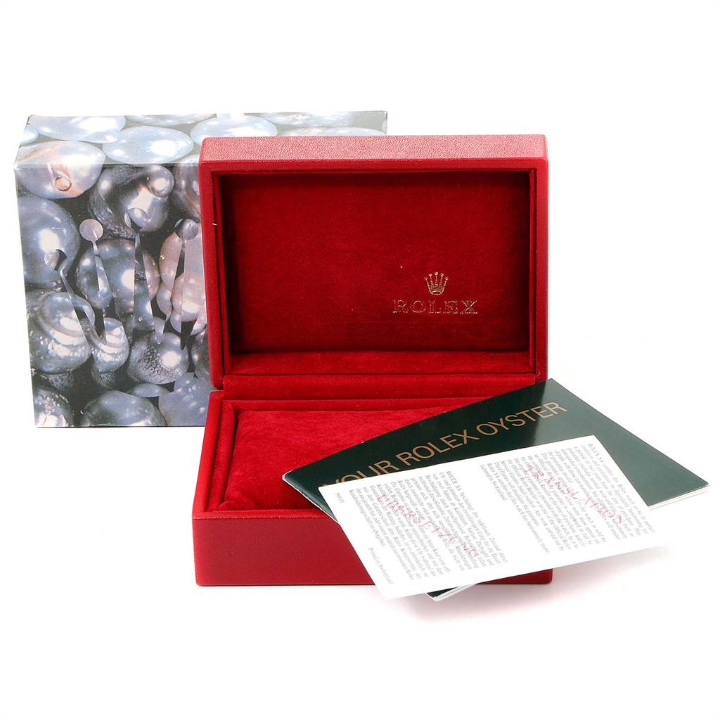 The image shows an empty red Rolex box with a booklet titled "Your Rolex Oyster" for the Oyster Perpetual model.