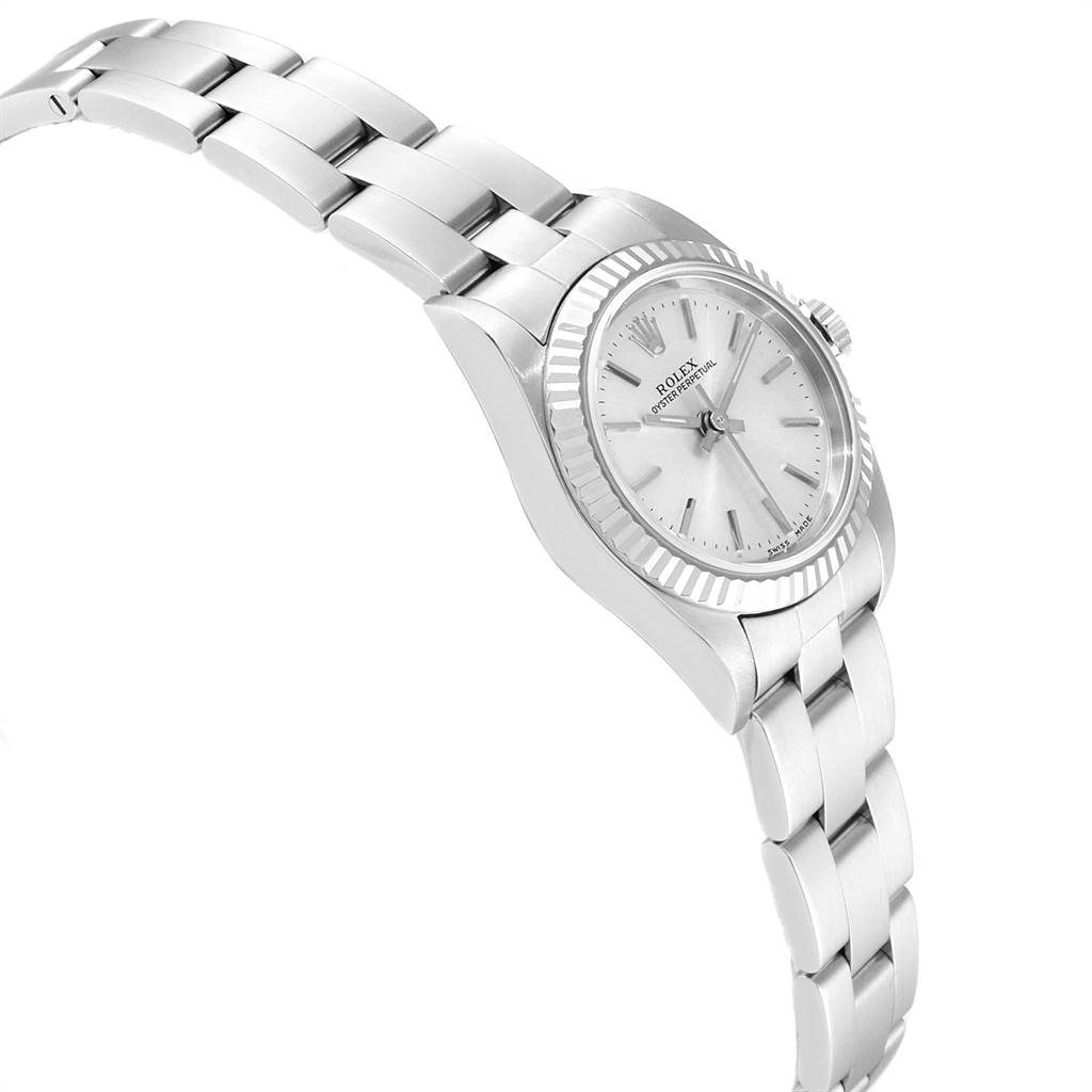 The image shows a Rolex Oyster Perpetual 76094 Women's Stainless Steel Silver Dial 76094 Women's Stainless Steel Silver Dial watch from a side angle, highlighting the bracelet, bezel, and dial.