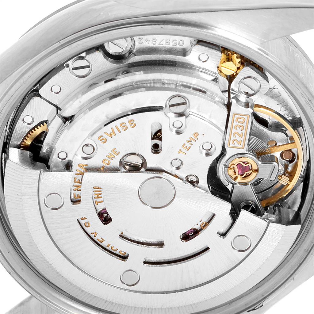 The image shows the internal movement and parts of a Rolex Oyster Perpetual 76030 Women's Stainless Steel Pink Dial 76030 Women's Stainless Steel Pink Dial watch from a close-up, rear angle.