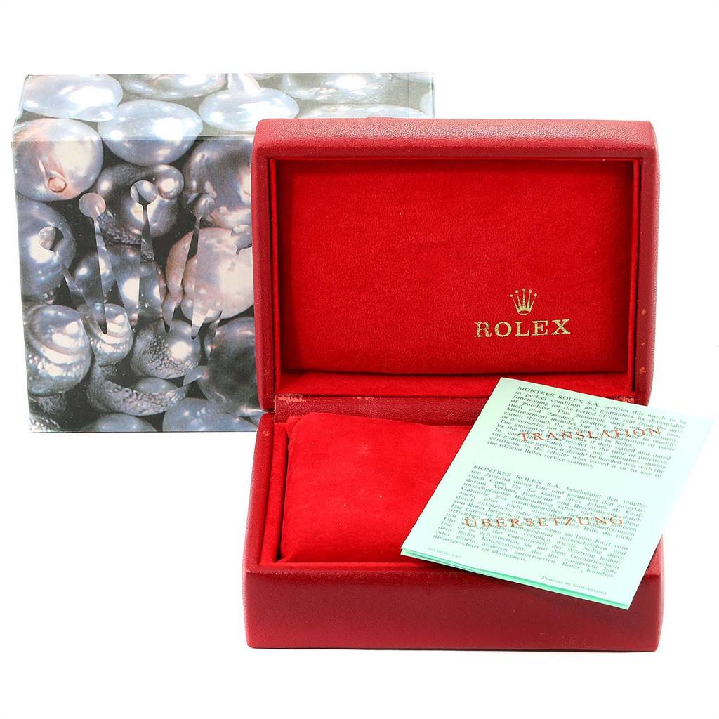 The image shows a Rolex Oyster Perpetual 76030 Women's Stainless Steel Pink Dial 76030 Women's Stainless Steel Pink Dial watch box with red lining and accompanying documentation.