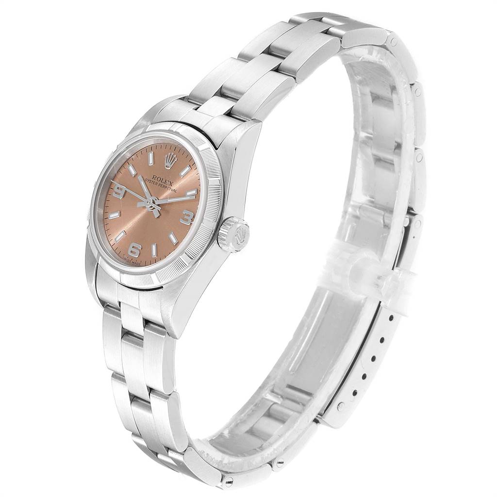 The Rolex Oyster Perpetual 76030 Women's Stainless Steel Pink Dial 76030 Women's Stainless Steel Pink Dial watch is shown at a three-quarter angle, displaying the case, dial, crown, and bracelet.