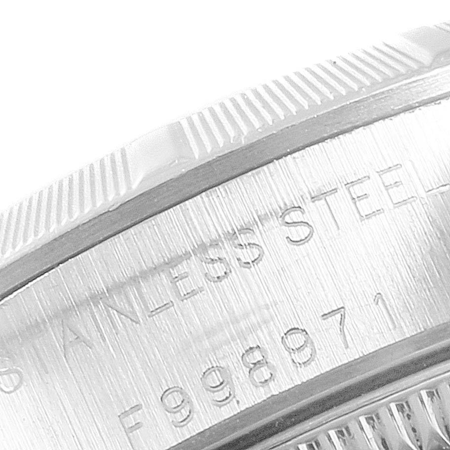 This image shows a close-up of the stainless steel case back with engravings of the Rolex Oyster Perpetual 76030 Women's Stainless Steel Pink Dial 76030 Women's Stainless Steel Pink Dial watch.