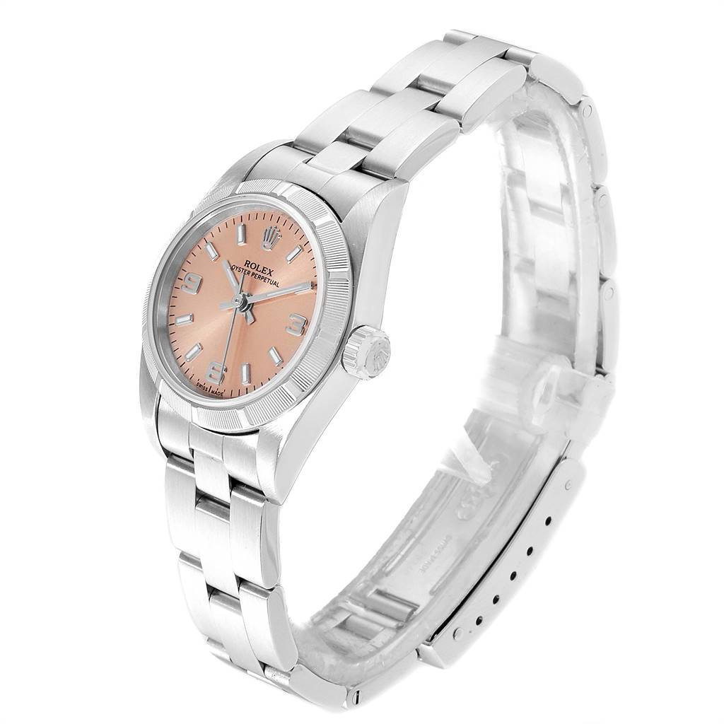 The image shows a Rolex Oyster Perpetual 76030 Women's Stainless Steel Pink Dial 76030 Women's Stainless Steel Pink Dial watch at a slight side angle, highlighting the bracelet, crown, and a pink dial.