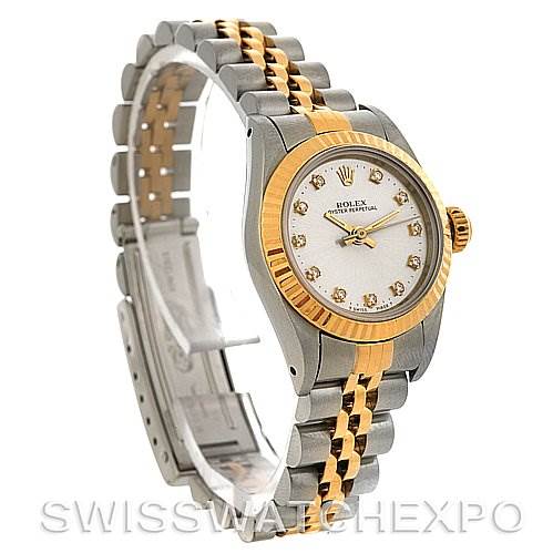 This image shows a side angle of the Rolex Oyster Perpetual 67193 Women's Steel and Gold (two tone) Silver Dial 67193 Women's Steel and Gold (two tone) Silver Dial watch, displaying the face, bezel, and part of the bracelet.
