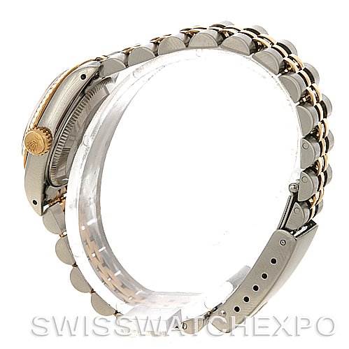 This image shows a side view of the Rolex Oyster Perpetual 67193 Women's Steel and Gold (two tone) Silver Dial 67193 Women's Steel and Gold (two tone) Silver Dial watch, highlighting its case and bracelet.