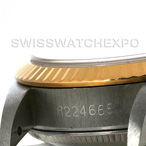 The image shows a close-up side angle of a Rolex Oyster Perpetual 67193 Women's Steel and Gold (two tone) Silver Dial 67193 Women's Steel and Gold (two tone) Silver Dial watch's case, featuring the serial number "R224665" and the bezel.