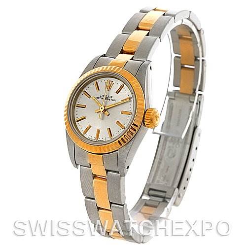 The Rolex Oyster Perpetual 67193 Women's Steel and Gold (two tone) Silver Dial 67193 Women's Steel and Gold (two tone) Silver Dial watch is shown at an oblique angle, displaying the face, bezel, and bi-tone bracelet.