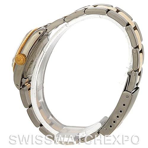 Side angle view of a Rolex Oyster Perpetual 67193 Women's Steel and Gold (two tone) Silver Dial 67193 Women's Steel and Gold (two tone) Silver Dial watch, showing the bracelet, clasp, crown, and part of the case.