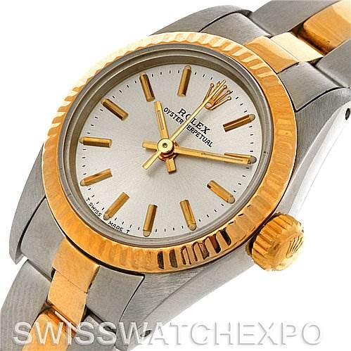 This image shows a Rolex Oyster Perpetual 67193 Women's Steel and Gold (two tone) Silver Dial 67193 Women's Steel and Gold (two tone) Silver Dial watch from a top and slightly angled view, highlighting the bezel, dial, and bracelet.