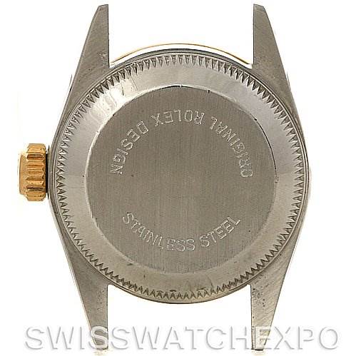 The image shows the back case and crown of a Rolex Oyster Perpetual 67193 Women's Steel and Gold (two tone) Silver Dial 67193 Women's Steel and Gold (two tone) Silver Dial watch.