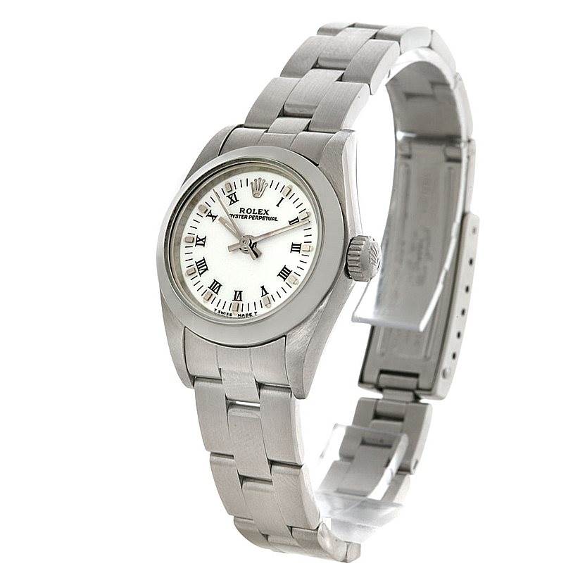 The image shows a Rolex Oyster Perpetual 67180 Women's Stainless Steel White Dial 67180 Women's Stainless Steel White Dial watch from a side angle, displaying its dial, bezel, and bracelet.