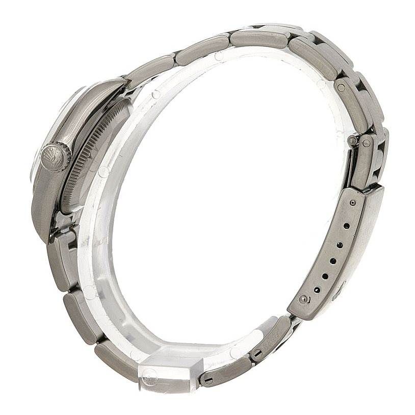 This image shows a side profile of the Rolex Oyster Perpetual 67180 Women's Stainless Steel White Dial 67180 Women's Stainless Steel White Dial watch, highlighting the crown and bracelet.