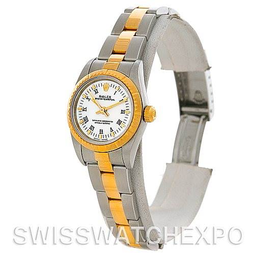 The Rolex Oyster Perpetual 76243 Women's Steel and Gold (two tone) White Dial 76243 Women's Steel and Gold (two tone) White Dial watch is shown at a three-quarter angle, highlighting its gold and silver bracelet and white dial.
