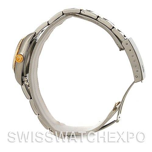 The image shows a side view of the Rolex Oyster Perpetual 76243 Women's Steel and Gold (two tone) White Dial 76243 Women's Steel and Gold (two tone) White Dial watch, highlighting its bracelet, clasp, and crown.