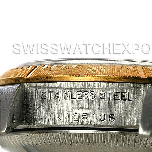 This image shows a close-up of the side of a Rolex Oyster Perpetual 76243 Women's Steel and Gold (two tone) White Dial 76243 Women's Steel and Gold (two tone) White Dial watch, highlighting the inscription "STAINLESS STEEL K125106".