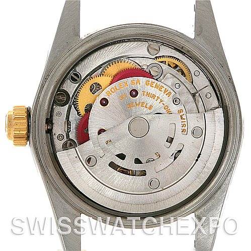 This image shows the internal mechanism of a Rolex Oyster Perpetual 76243 Women's Steel and Gold (two tone) White Dial 76243 Women's Steel and Gold (two tone) White Dial watch, viewed from the back with the case removed.