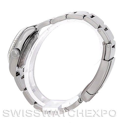 This side view of the Rolex Oyster Perpetual 176234 Women's Stainless Steel White Dial 176234 Women's Stainless Steel White Dial showcases the case, crown, and bracelet in a closed position.