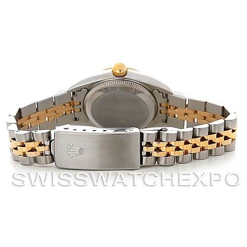 This image shows the back and clasp of a Rolex Oyster Perpetual 67193 Women's Steel and Gold (two tone) Champagne Dial 67193 Women's Steel and Gold (two tone) Champagne Dial watch with a two-tone bracelet.
