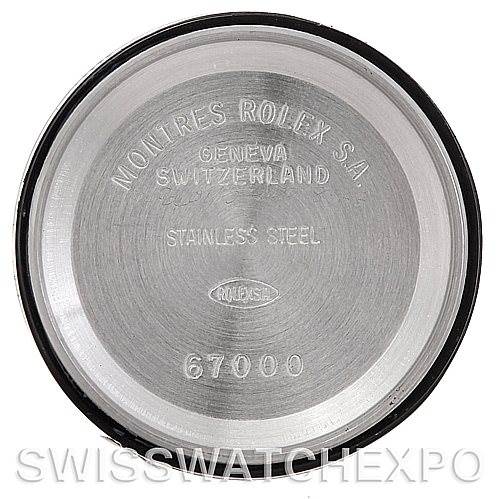 This image shows the inner case back of a Rolex Oyster Perpetual 67180 Women's Stainless Steel Blue Dial 67180 Women's Stainless Steel Blue Dial watch, including inscriptions and model number.