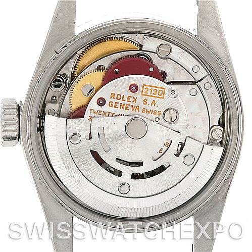The image shows the inner movement mechanism of a Rolex Oyster Perpetual 67180 Women's Stainless Steel Blue Dial 67180 Women's Stainless Steel Blue Dial watch from a rear view angle.