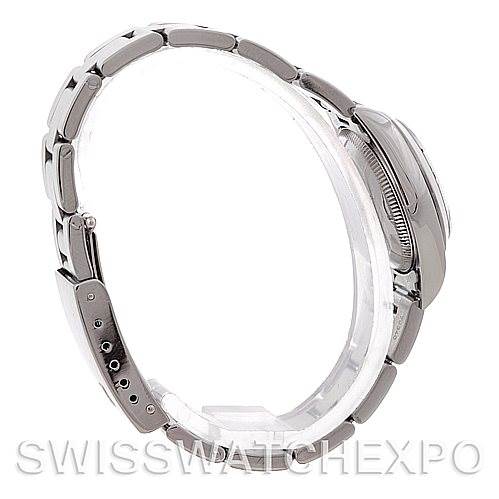 The image displays a side view of the Rolex Oyster Perpetual 67180 Women's Stainless Steel Blue Dial 67180 Women's Stainless Steel Blue Dial watch, focusing on the bracelet and case.