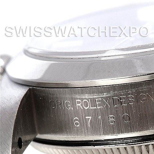 The image shows a side angle close-up of the casing and bezel for the Rolex Oyster Perpetual 67180 Women's Stainless Steel Blue Dial 67180 Women's Stainless Steel Blue Dial with partial model number engraving.
