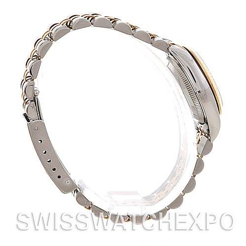 This image shows a side view of the Rolex Oyster Perpetual 76193 Women's Steel and Gold (two tone) Champagne Dial 76193 Women's Steel and Gold (two tone) Champagne Dial watch, focusing on the bracelet and the case.