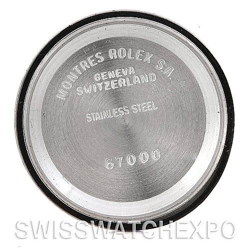 The image shows the case back of a Rolex Oyster Perpetual 67193 Women
s Steel and Gold (two tone) Silver Dial 67193 Women
s Steel and Gold (two tone) Silver Dial watch, displaying branding and model information.