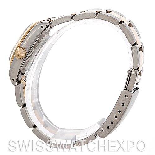 The image shows a side view of a Rolex Oyster Perpetual 67193 Women
s Steel and Gold (two tone) Silver Dial 67193 Women
s Steel and Gold (two tone) Silver Dial watch, highlighting the bracelet and crown.