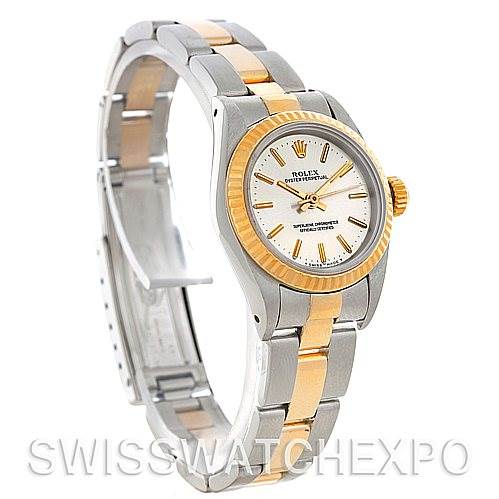 The image shows a Rolex Oyster Perpetual 67193 Women
s Steel and Gold (two tone) Silver Dial 67193 Women
s Steel and Gold (two tone) Silver Dial watch at an angle displaying its face, bezel, and bracelet.