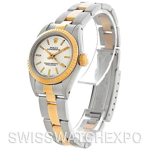 The image shows a side angle of a Rolex Oyster Perpetual 67193 Women
s Steel and Gold (two tone) Silver Dial 67193 Women
s Steel and Gold (two tone) Silver Dial watch, highlighting its bezel, dial, crown, and bracelet.