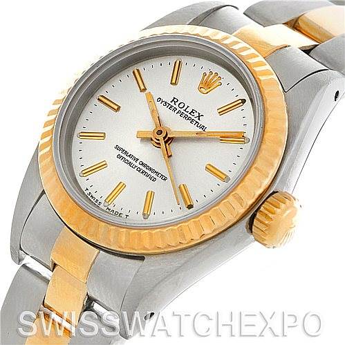 The image shows a Rolex Oyster Perpetual 67193 Women
s Steel and Gold (two tone) Silver Dial 67193 Women
s Steel and Gold (two tone) Silver Dial watch at an angled close-up, highlighting the dial, bezel, and part of the bracelet.