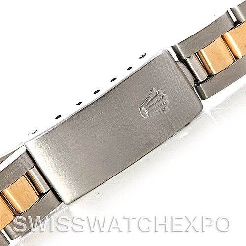 This image shows the clasp and part of the bracelet of a Rolex Oyster Perpetual 76183 Women's Steel and Gold (two tone) White Dial 76183 Women's Steel and Gold (two tone) White Dial watch, featuring a two-tone metal design.