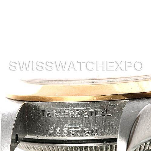 This image displays a close-up of the side of a Rolex Oyster Perpetual 76183 Women's Steel and Gold (two tone) White Dial 76183 Women's Steel and Gold (two tone) White Dial watch case showing the "STAINLESS STEEL" engraving and part of the bezel.