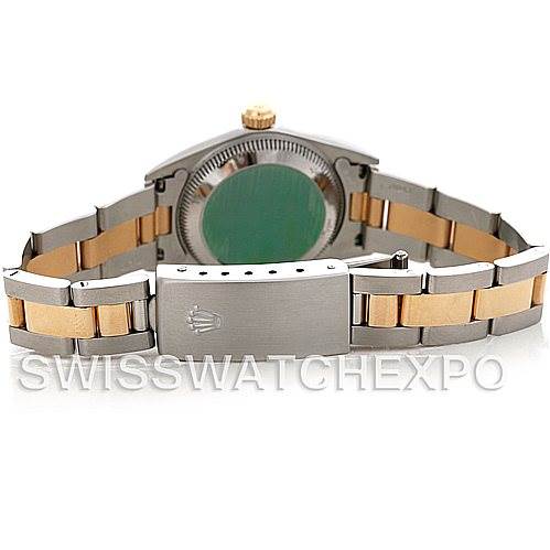 This image shows the back view of a Rolex Oyster Perpetual 76183 Women's Steel and Gold (two tone) White Dial 76183 Women's Steel and Gold (two tone) White Dial watch, highlighting its two-tone metal bracelet and clasp.