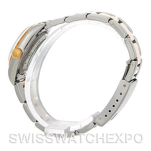 This image shows the Rolex Oyster Perpetual 76183 Women's Steel and Gold (two tone) White Dial 76183 Women's Steel and Gold (two tone) White Dial watch from a side angle, highlighting the case and the bracelet.