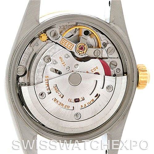 This image shows the inside mechanism of the Rolex Oyster Perpetual 76193 Women's Steel and Gold (two tone) Black Dial 76193 Women's Steel and Gold (two tone) Black Dial model, highlighting its movement components.