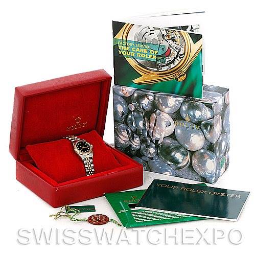 The image shows a Rolex Oyster Perpetual 76193 Women's Steel and Gold (two tone) Black Dial 76193 Women's Steel and Gold (two tone) Black Dial watch in a red box with accompanying booklets and tags, all viewed from a front angle.