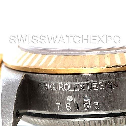 This image shows a close-up of the side of a Rolex Oyster Perpetual 76193 Women's Steel and Gold (two tone) Black Dial 76193 Women's Steel and Gold (two tone) Black Dial watch, highlighting the model number and "Orig. Rolex Design" engraving.