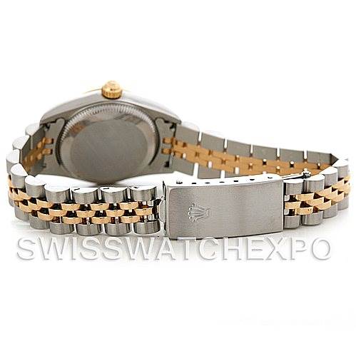 The image shows the back view and clasp of a Rolex Oyster Perpetual 76193 Women's Steel and Gold (two tone) Black Dial 76193 Women's Steel and Gold (two tone) Black Dial watch, highlighting its two-tone bracelet. 